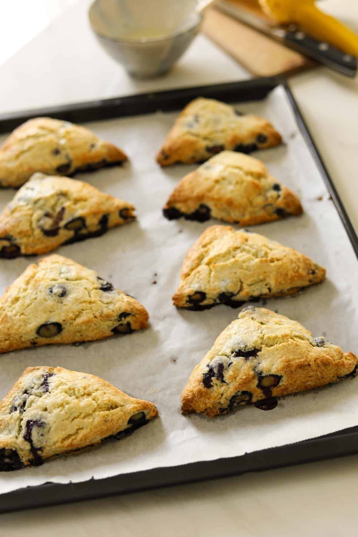 Glaze the scones on a baking tray.