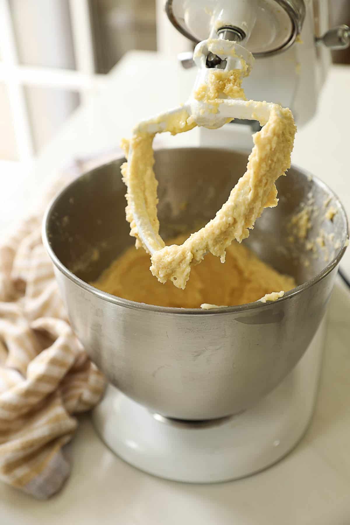 Almond filling in a standing mixer with paddle attachment.