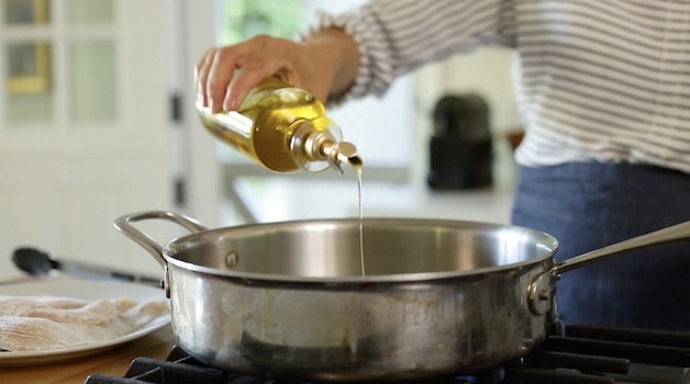Adding Olive Oil to a large skillet