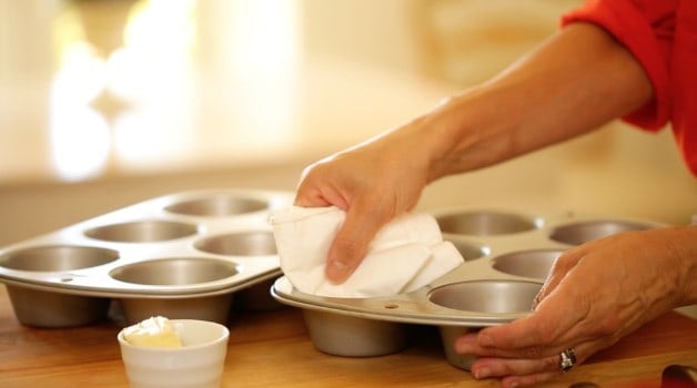 Greasing muffin tin for Make Ahead Oatmeal Cups Recipe 