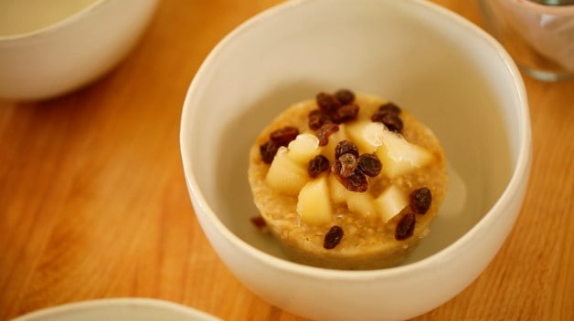 Frozen oatmeal cup in bowl for reheating