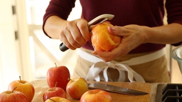 Peeling a gala apple