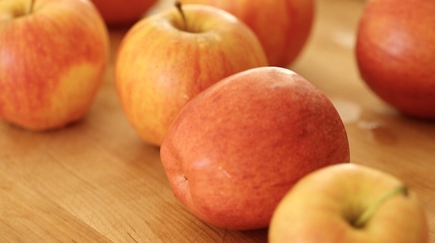 gala apples on a cutting board