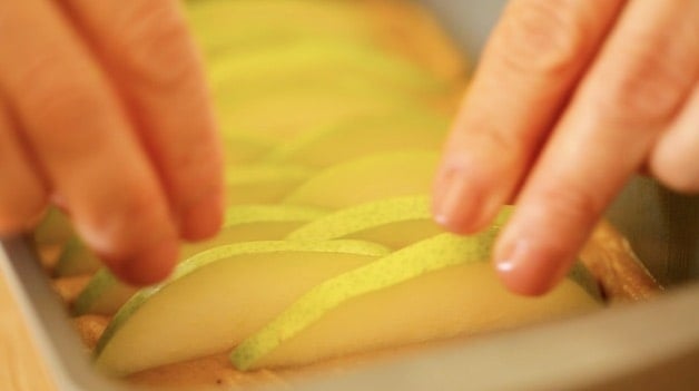 arranging pears in batter to stand upright