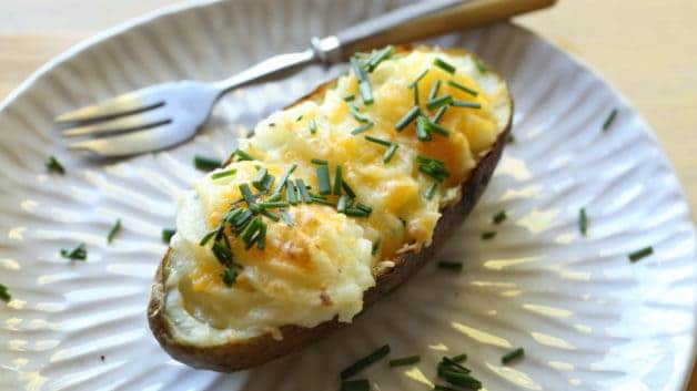 Twiced Baked Potato on a white plate