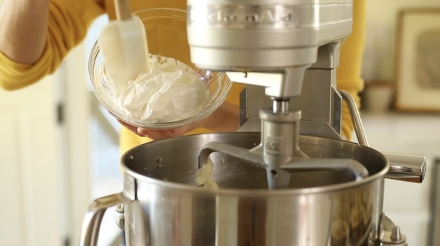 adding sour cream to a stand mixer