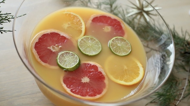 Orange, Grapefruit and Lime Wheels Floating in a Christmas Punch