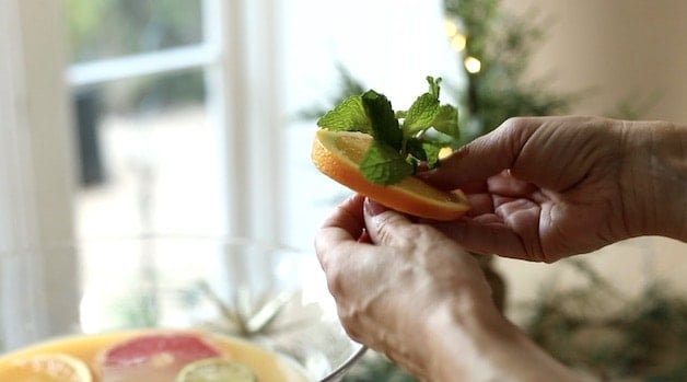 Adding Fresh Mint to the center of a Navel Orange Wheel