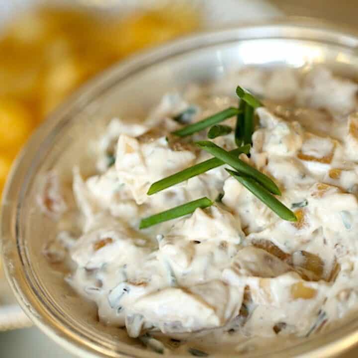 Sour Cream Onion Dip in Silver Bowl with Chive Garnish