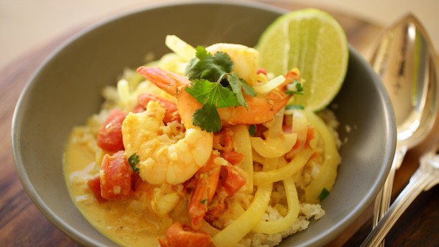 Shrimp Curry in a gray bowl with a lime