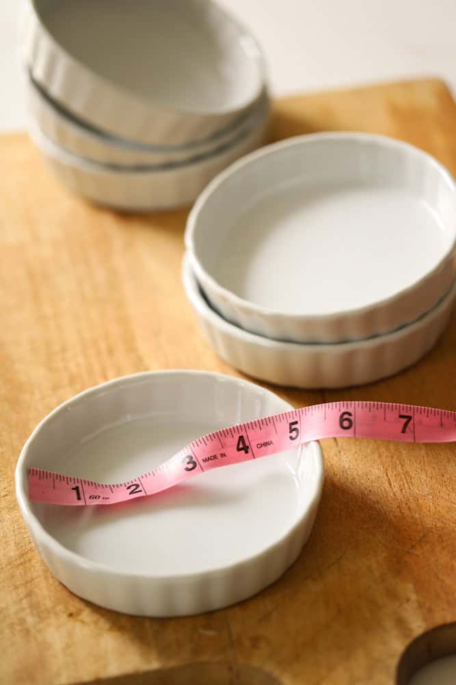 Quiche dishes measuring 5" with a tape measure.