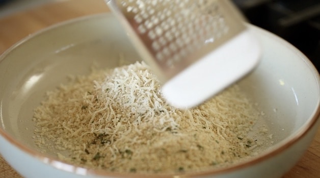 Adding Parmesean cheese to bread crumb mixture
