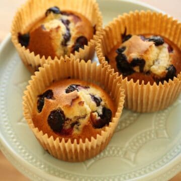 Air Fryer Blueberry Muffins on a Blue Plate