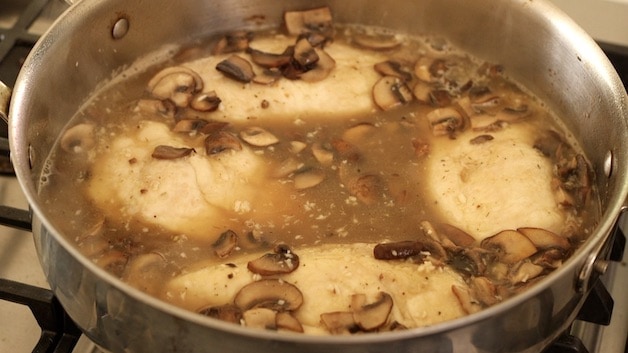 chicken breasts simmering in Marsala Wine Sauce with Mushrooms