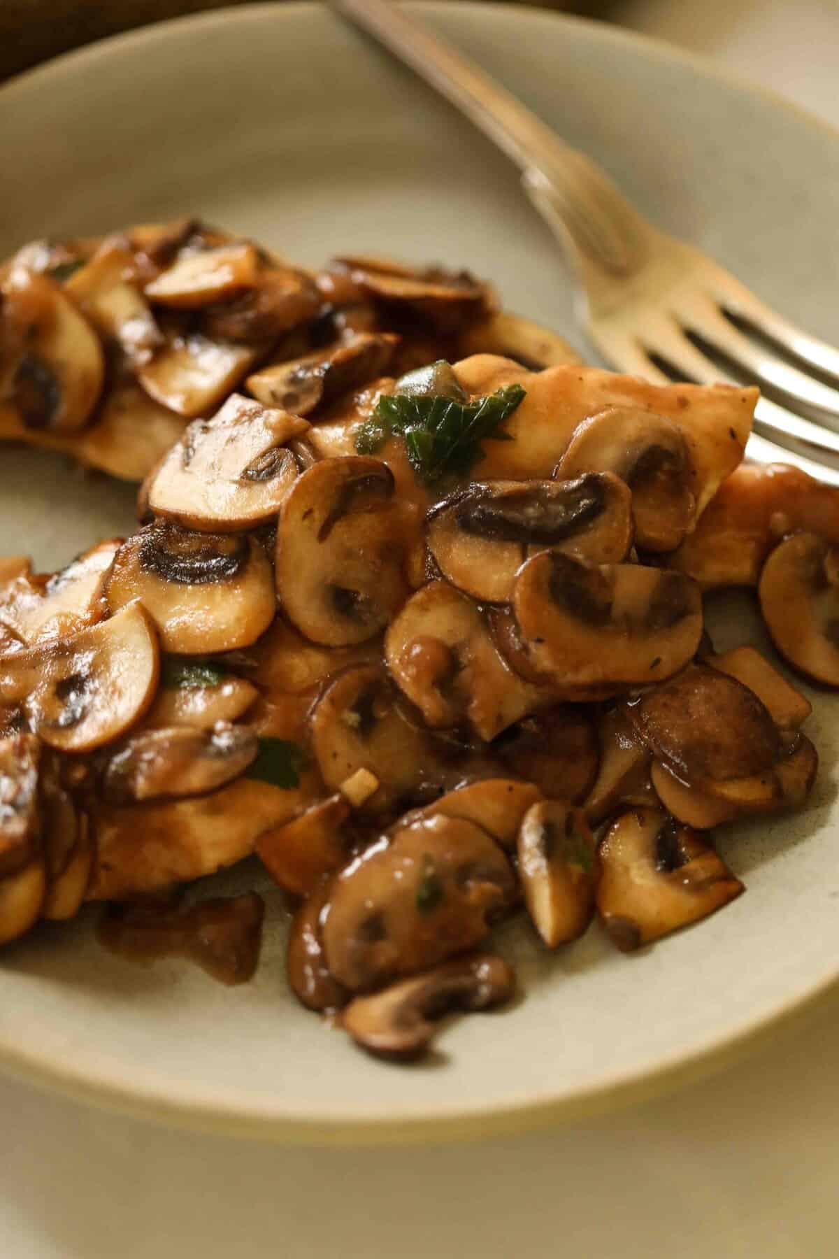 Chicken and mushrooms on a plate
