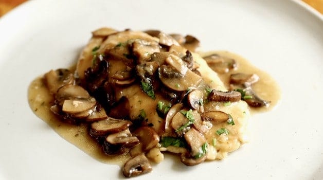 a serving of chicken marsala on a plate