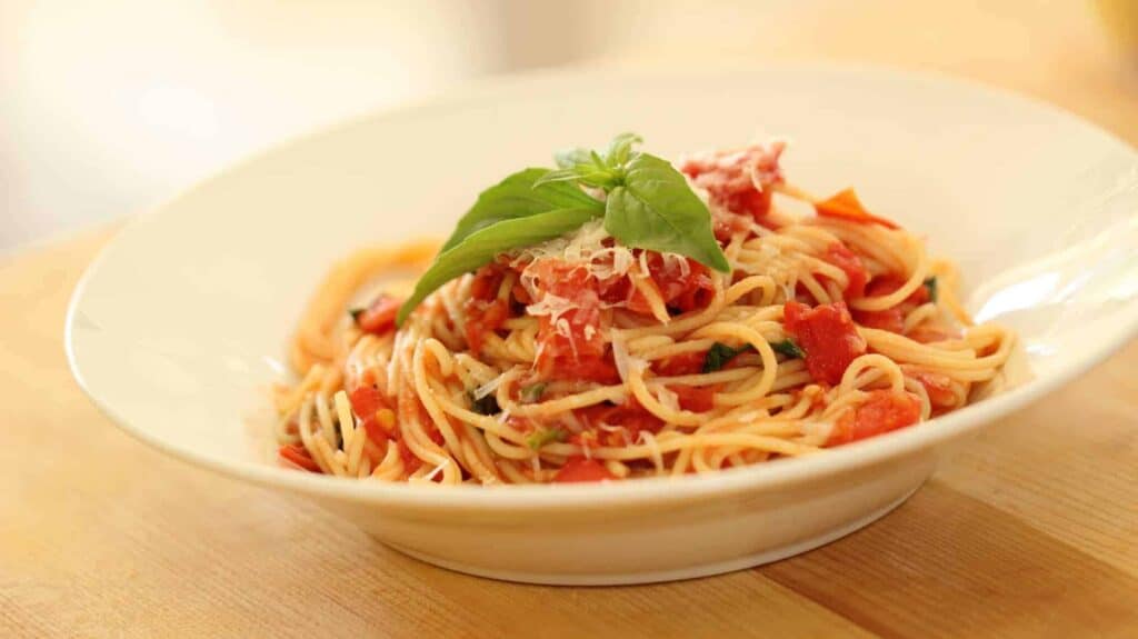 A plate of pasta with homemade tomato sauce