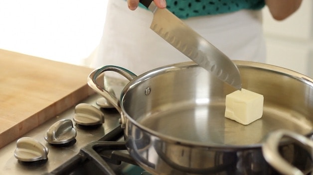 Adding butter to a skillet