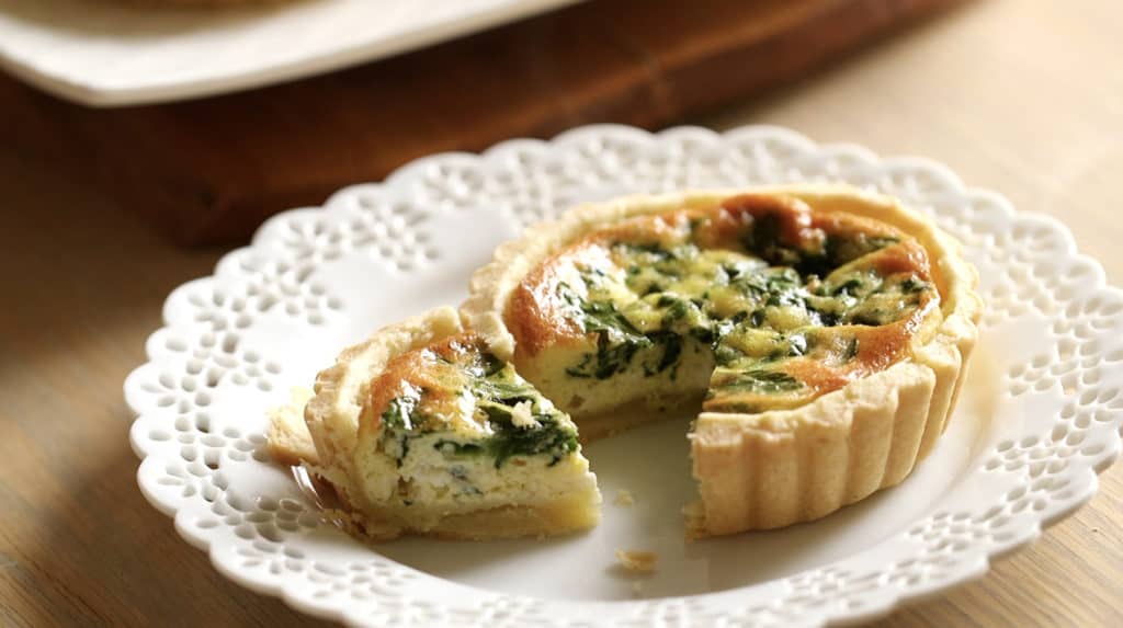 Spinach and Feta Mini Quiche on a white plate