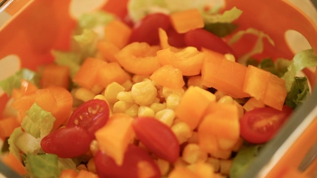 Southwestern salad with tomatoes corn and red peppers
