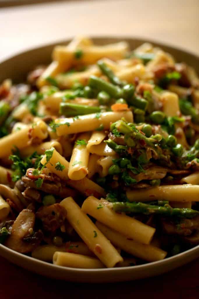 Ziti pasta with spring vegetables and Parmesan