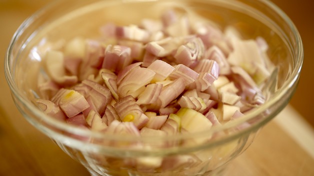 diced shallots in a glass bowl