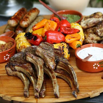 Mixed Grill on a serving board with vegetables