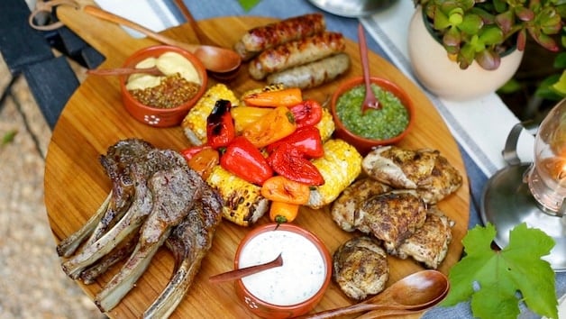 a board showing a mixed grill dinner