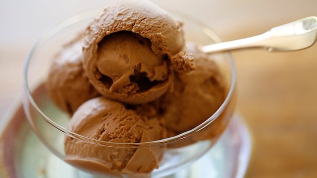 A glass dish filled with scoops of Nutela Ice Cream