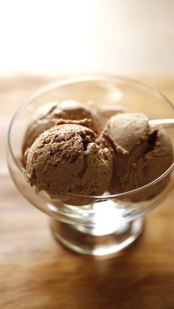 Vertical Image of Ice Cream in a glass bowl