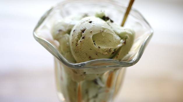 An Ice Cream Glass filled with Mint Chocolate Chip Ice Cream 