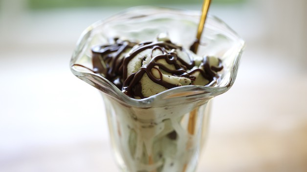 A hot Fudge Drizzle on Mint Chip Ice Cream