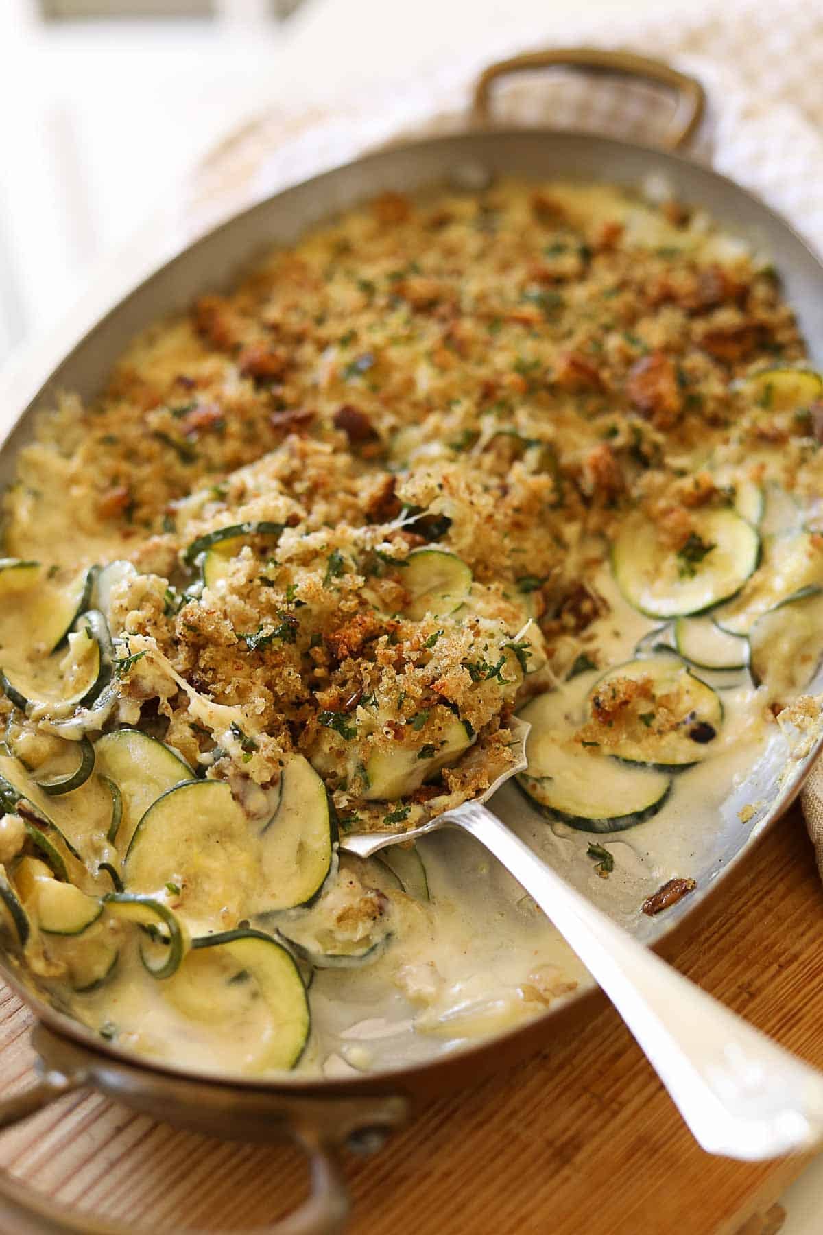 Baked Zucchini casserole with cheese and breadcrumbs.