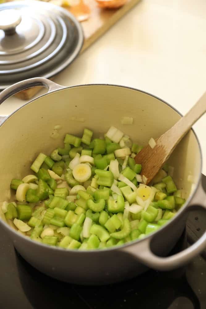 Sautéing vegetables in a large dutch oven.