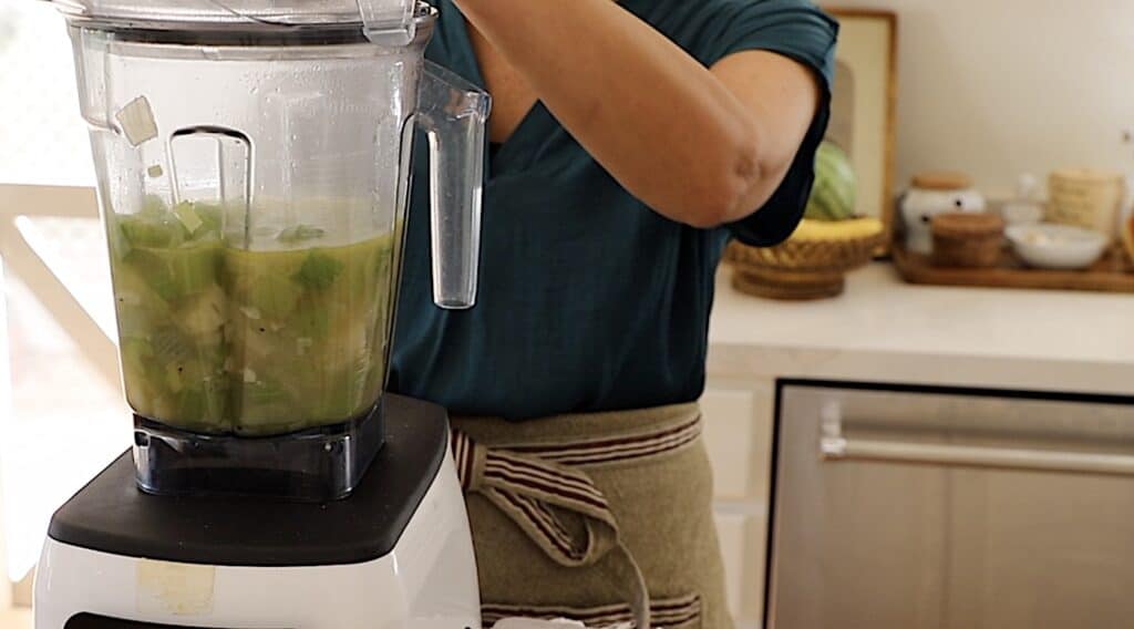 Soup ingredients in a blender ready to be pureed