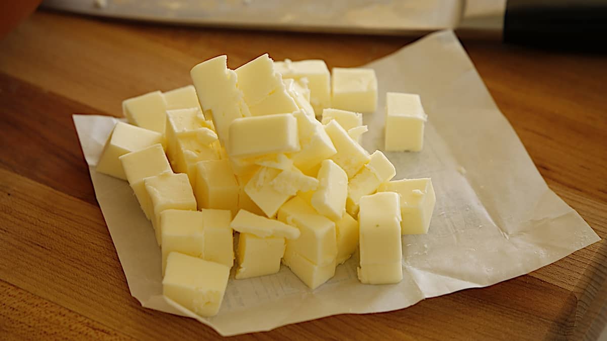 diced butter piled high on a butter wrapper