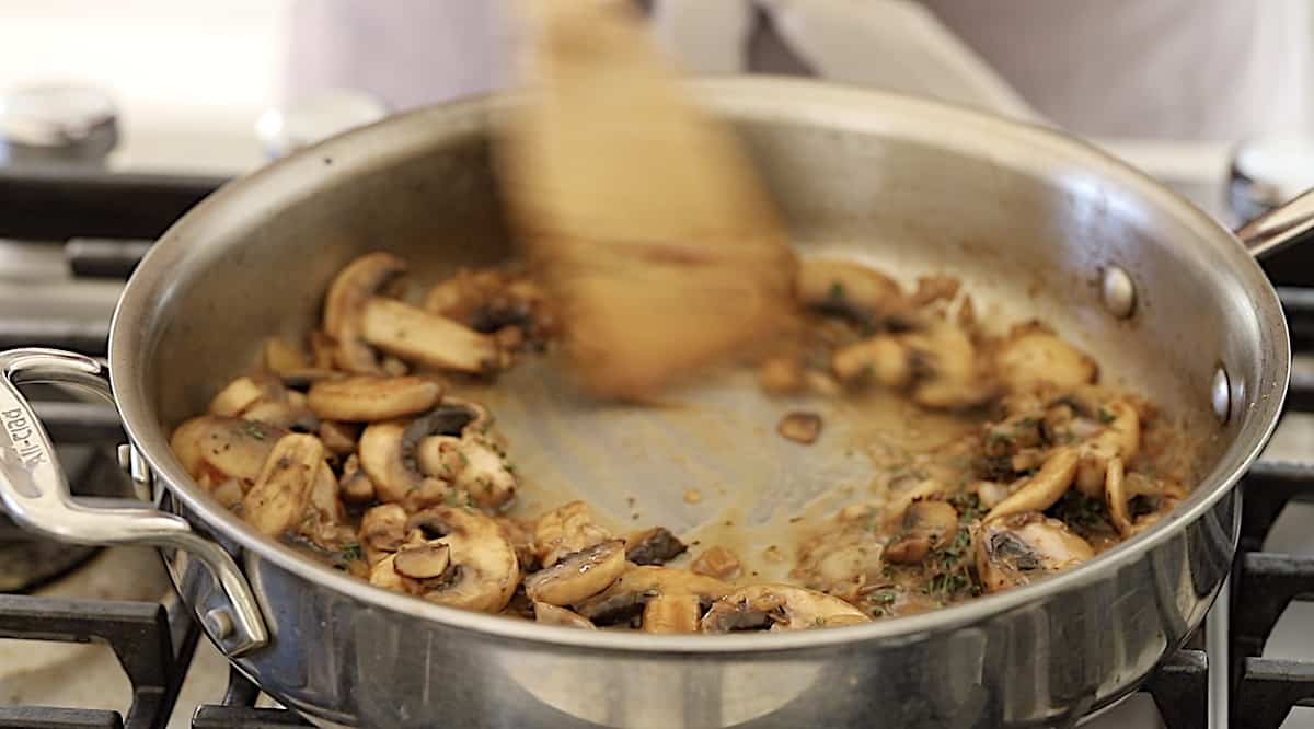 cooking mushrooms in a skillet