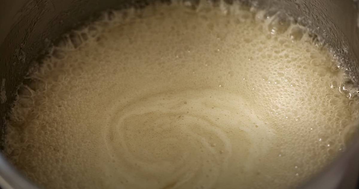 peanut brittle syrup boiling in a pot