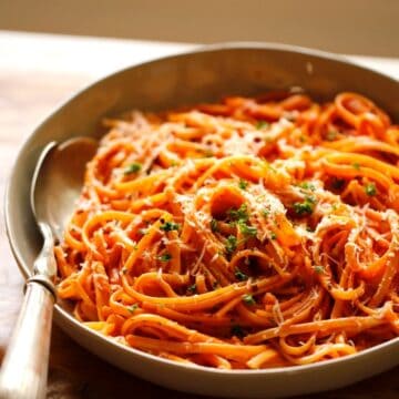 Creamy Tomato Sauce with Linguine is a Large bowl with Silver Spoon