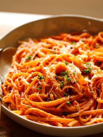 Creamy Tomato Sauce with Linguine is a Large bowl with Silver Spoon