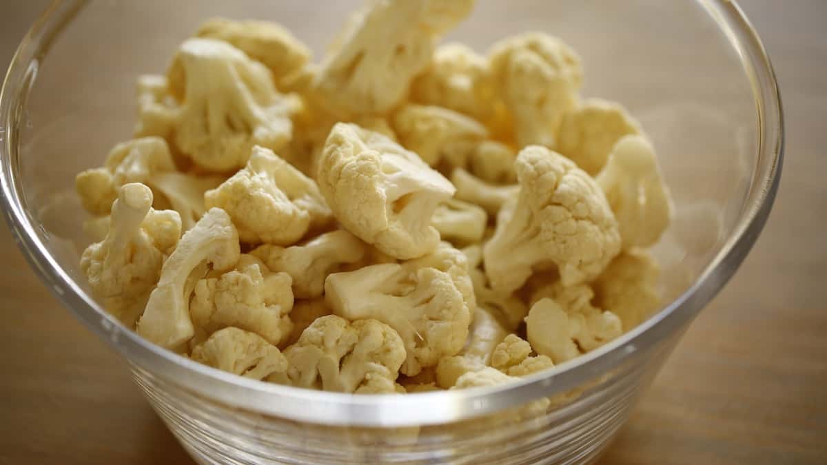 Cauliflower florets in a clear bowl 