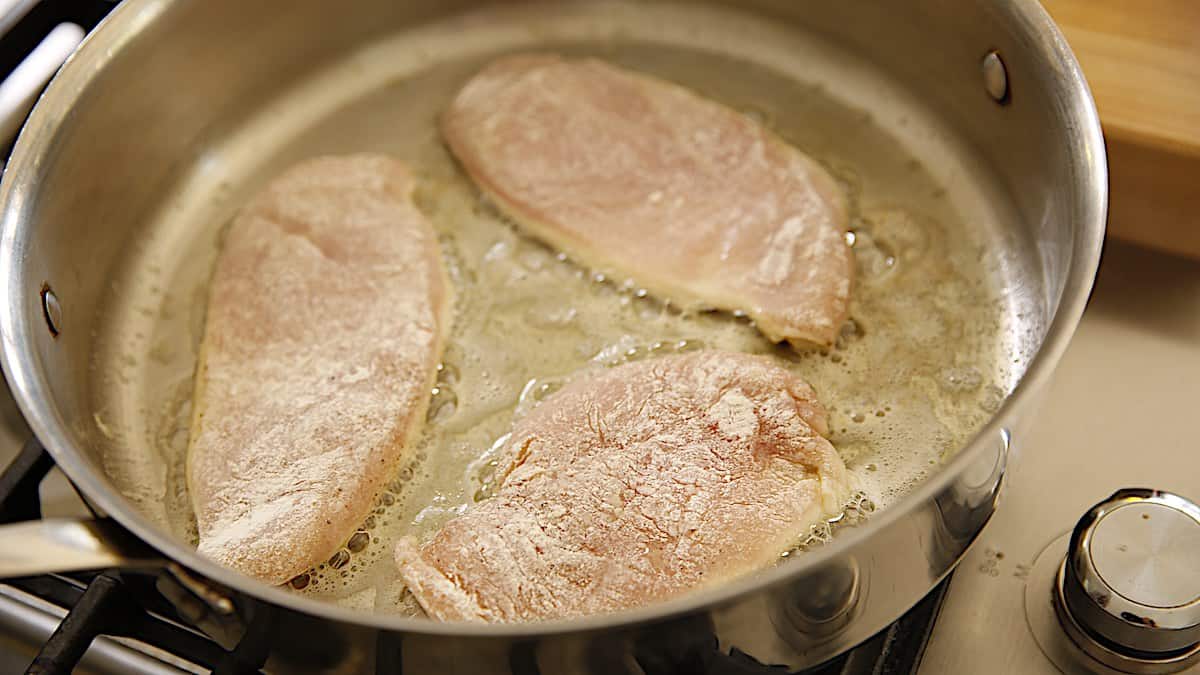 Chicken Cutlets Browning in a Pan