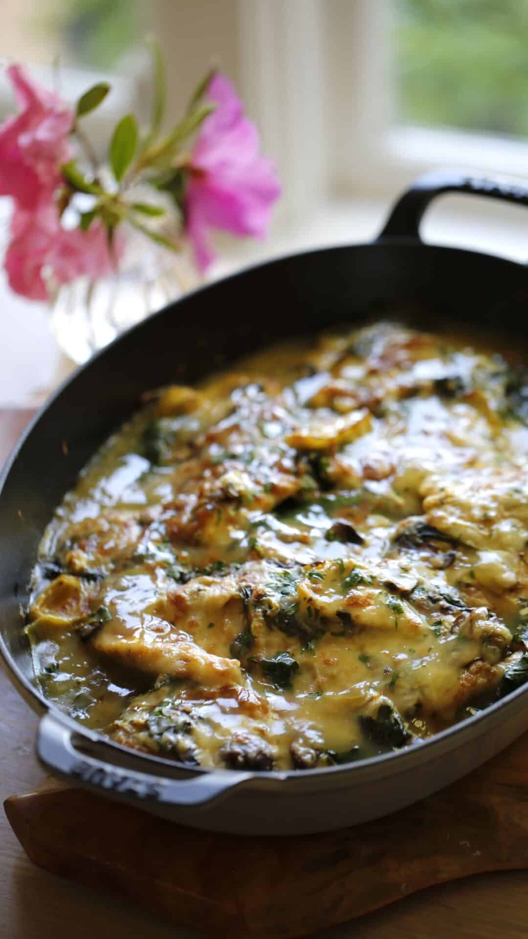 an Artichoke Spinach and Mozzarella Chicken Bake in a Gratin Dish