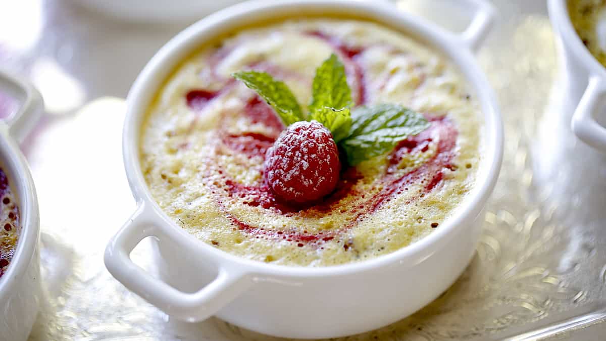 Lemon Bar Filling and Brownie Bottom Dessert in a white ramekin