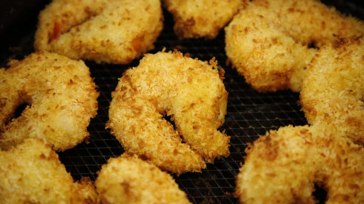 Air Fryer Coconut Shrimp in an air fryer basket