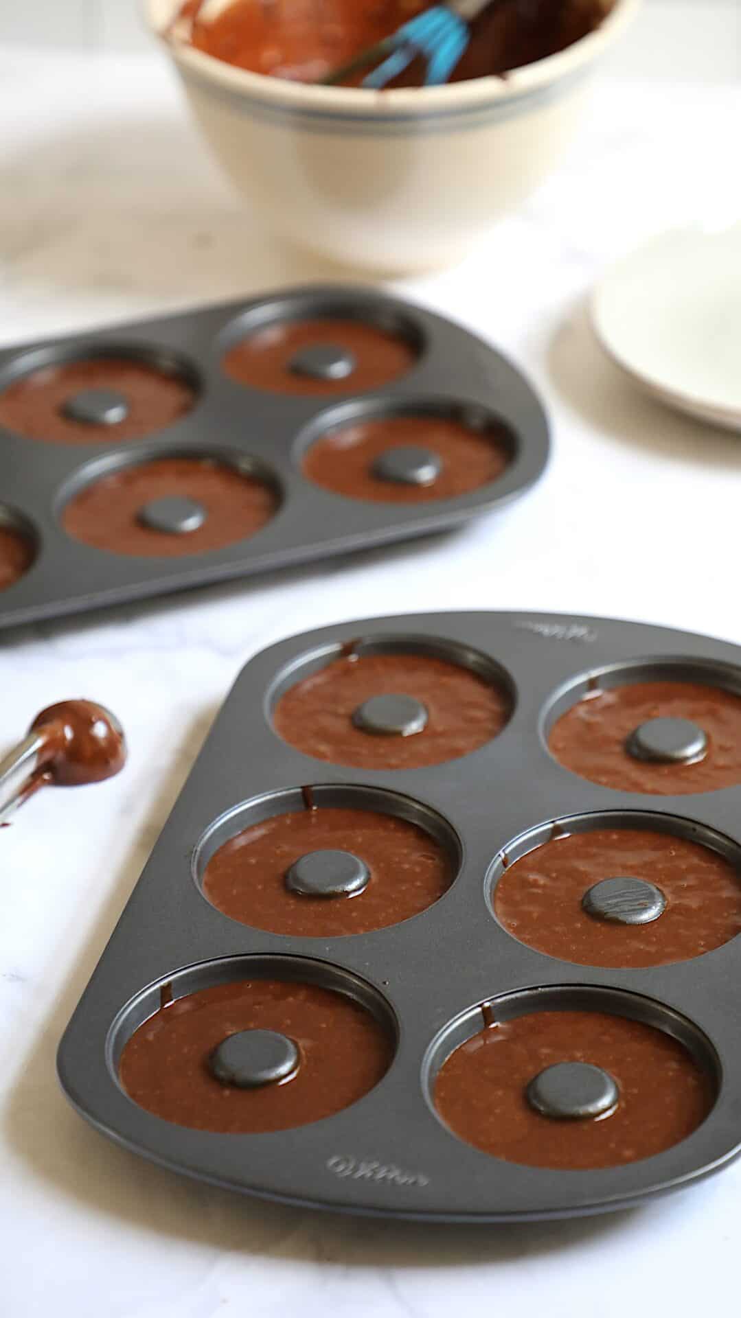 Two Donut Pans filled with Batter