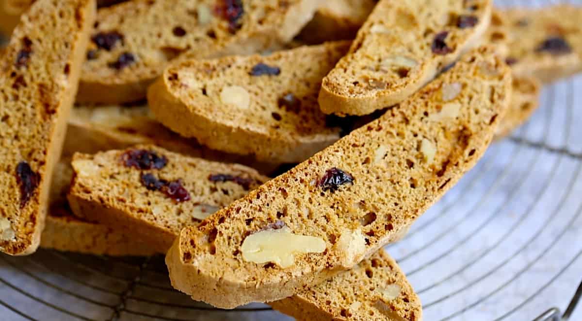 Close up of cranberries, walnuts and ginger in biscotti cookie