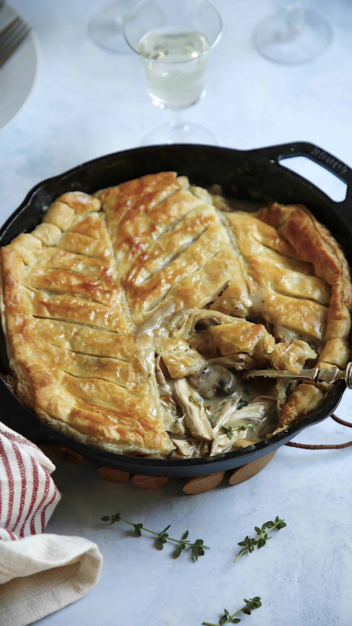 a cut out section showing filling of chicken and mushroom pie