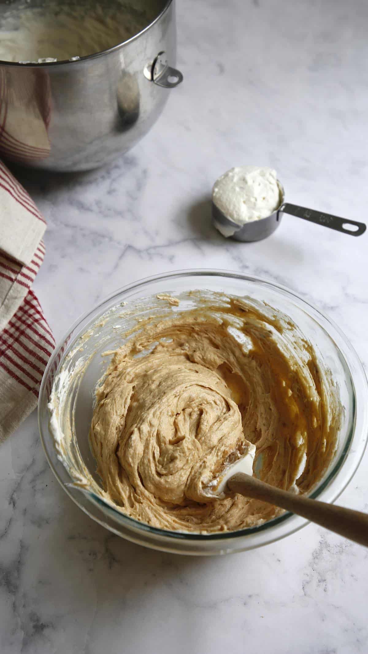 folding in whipped cream into the peanut butter mixture