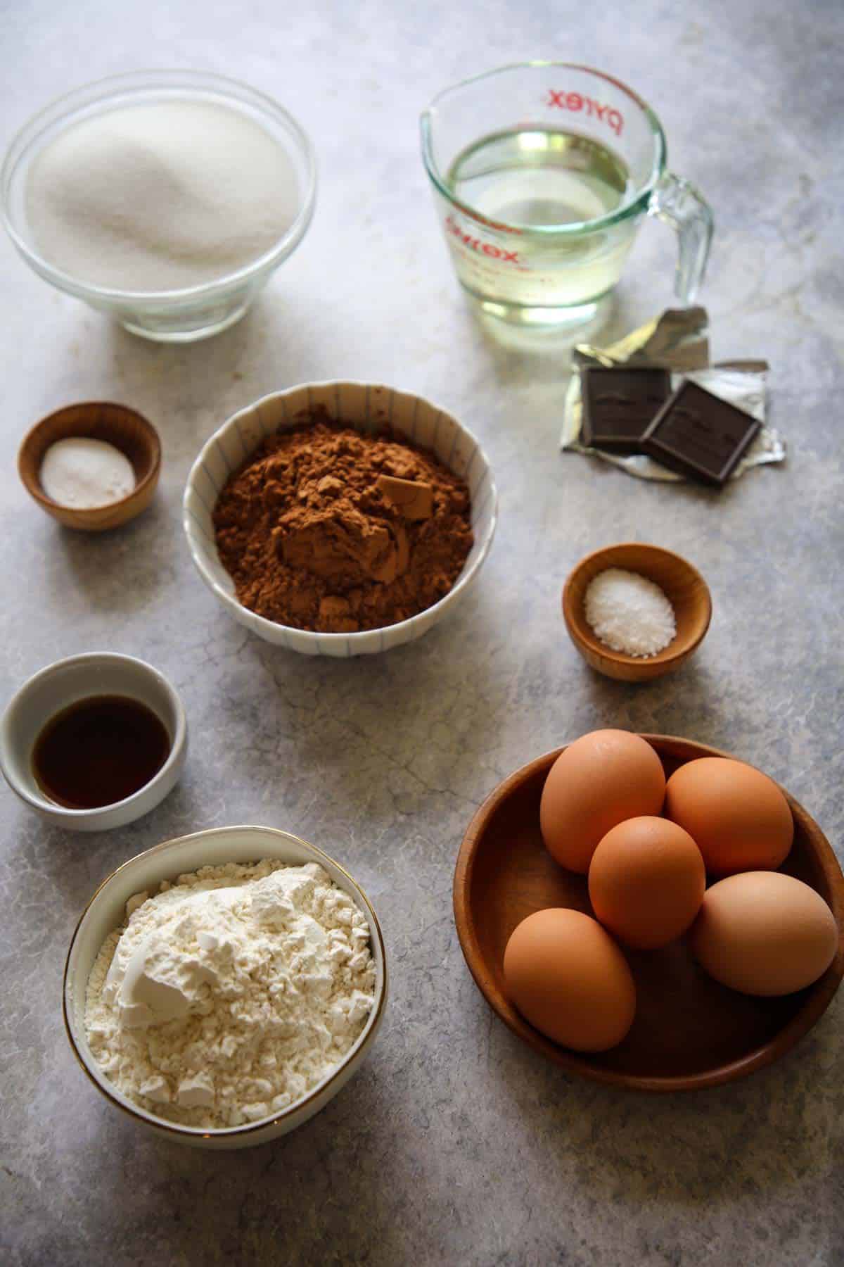 Ingredients laid out on a counter for a chocolate cake